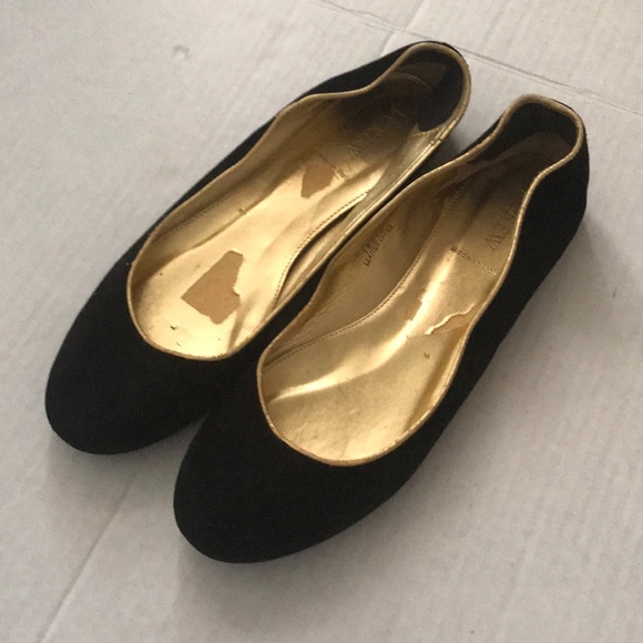 black flats with gold trim
